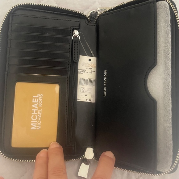 Jet Set Travel Large Pebbled Leather Wristlet - Picture 3 of 3